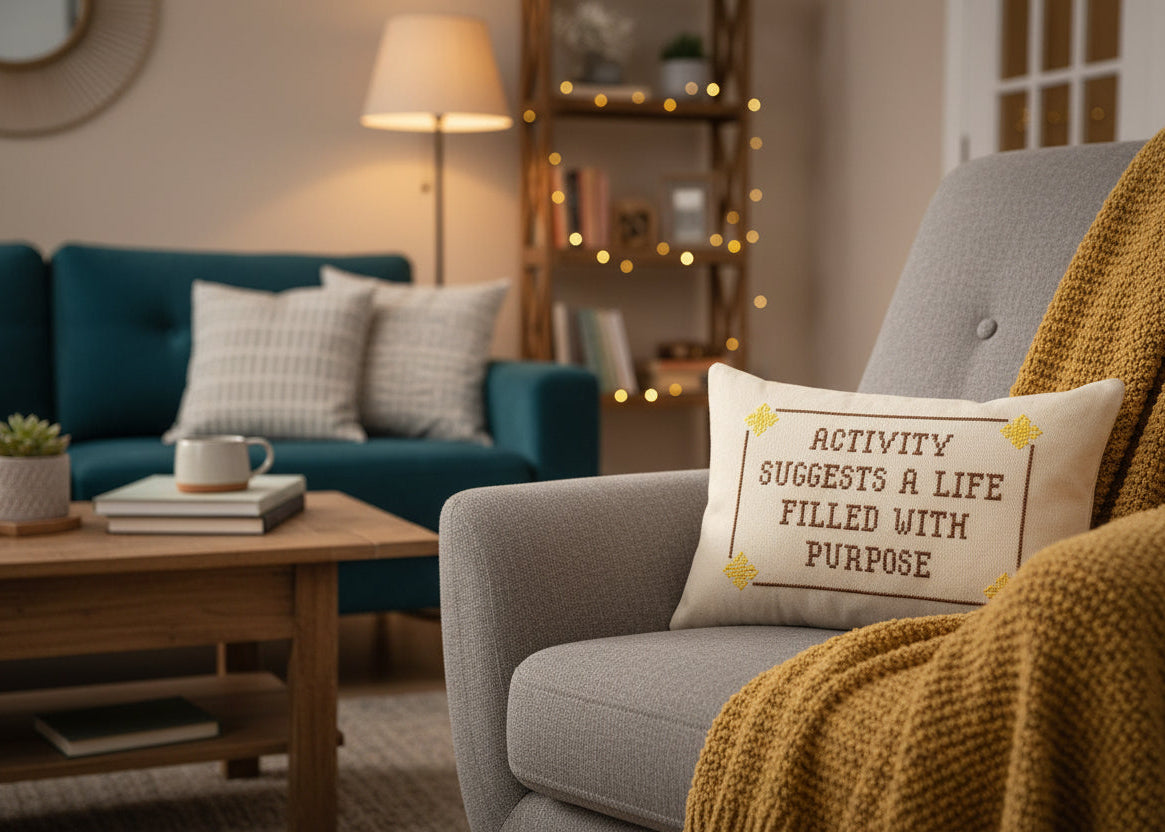Cozy living room with a gray armchair, teal sofa, and wooden coffee table.