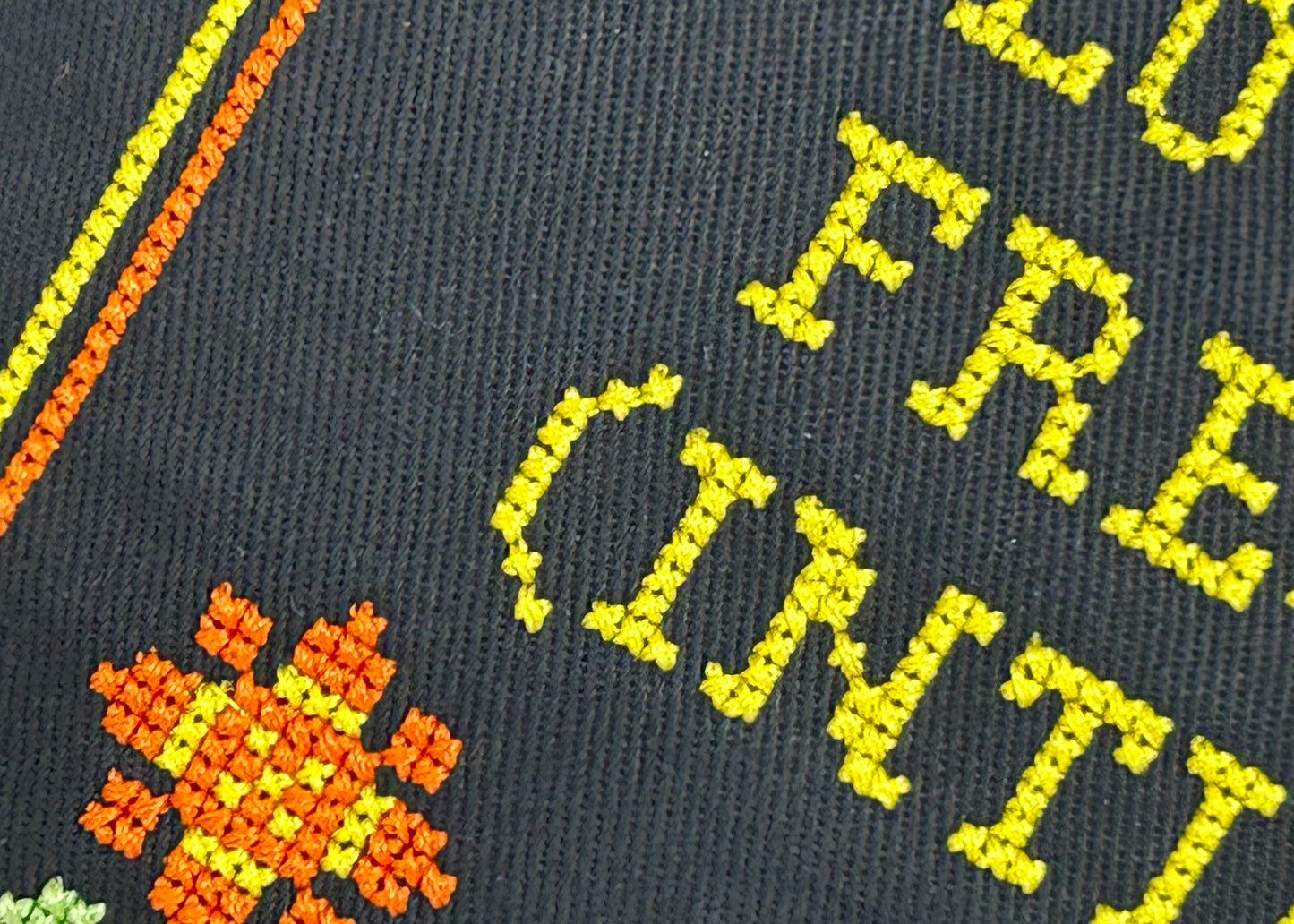 Text and floral design on a fabric background